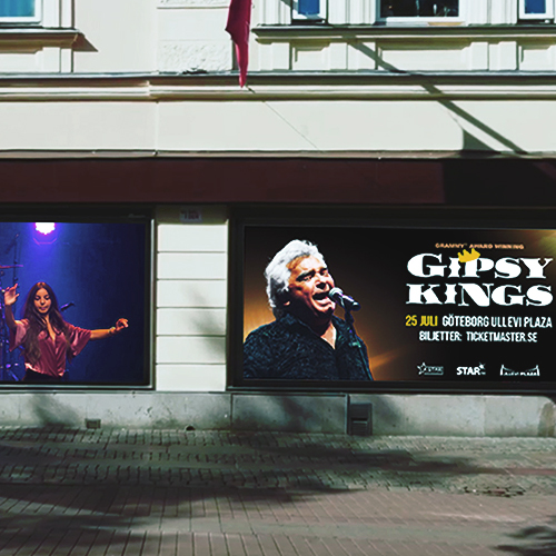 Two big LED screens on Valand in Gothenburg showing and advert for the Gipsy Kings concert at Ullevi Plaza in black, yellow and white colors.