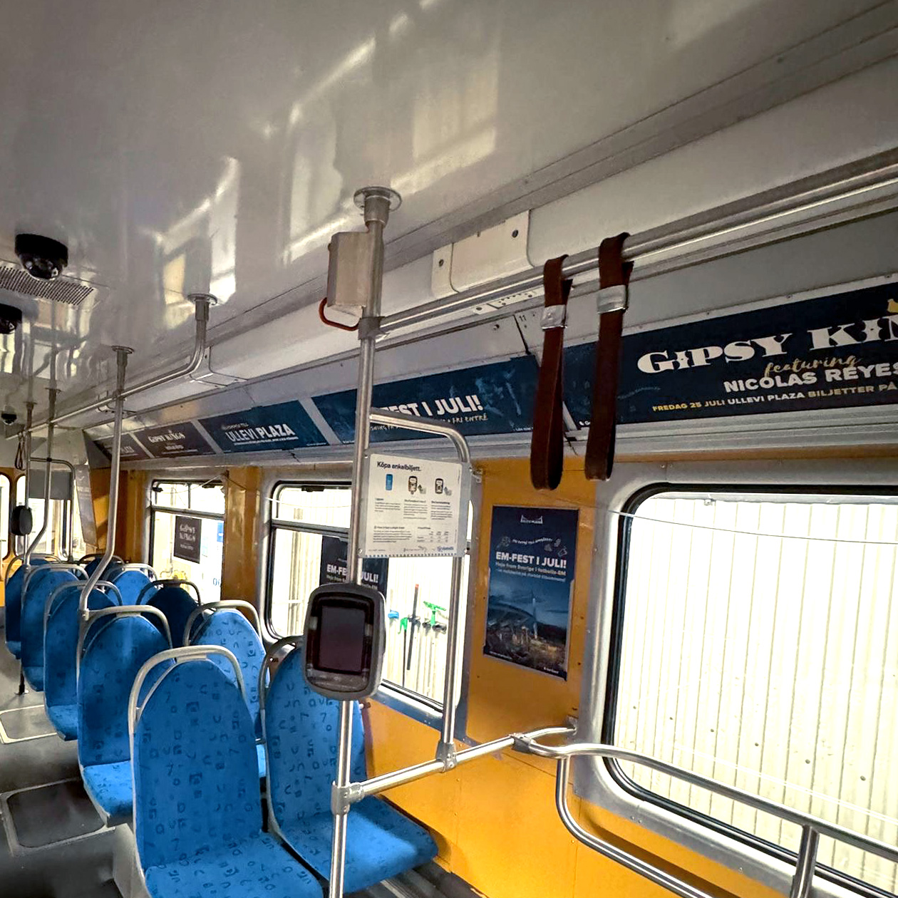 A picture from the installment of print material such as posters for the inside of the tram.